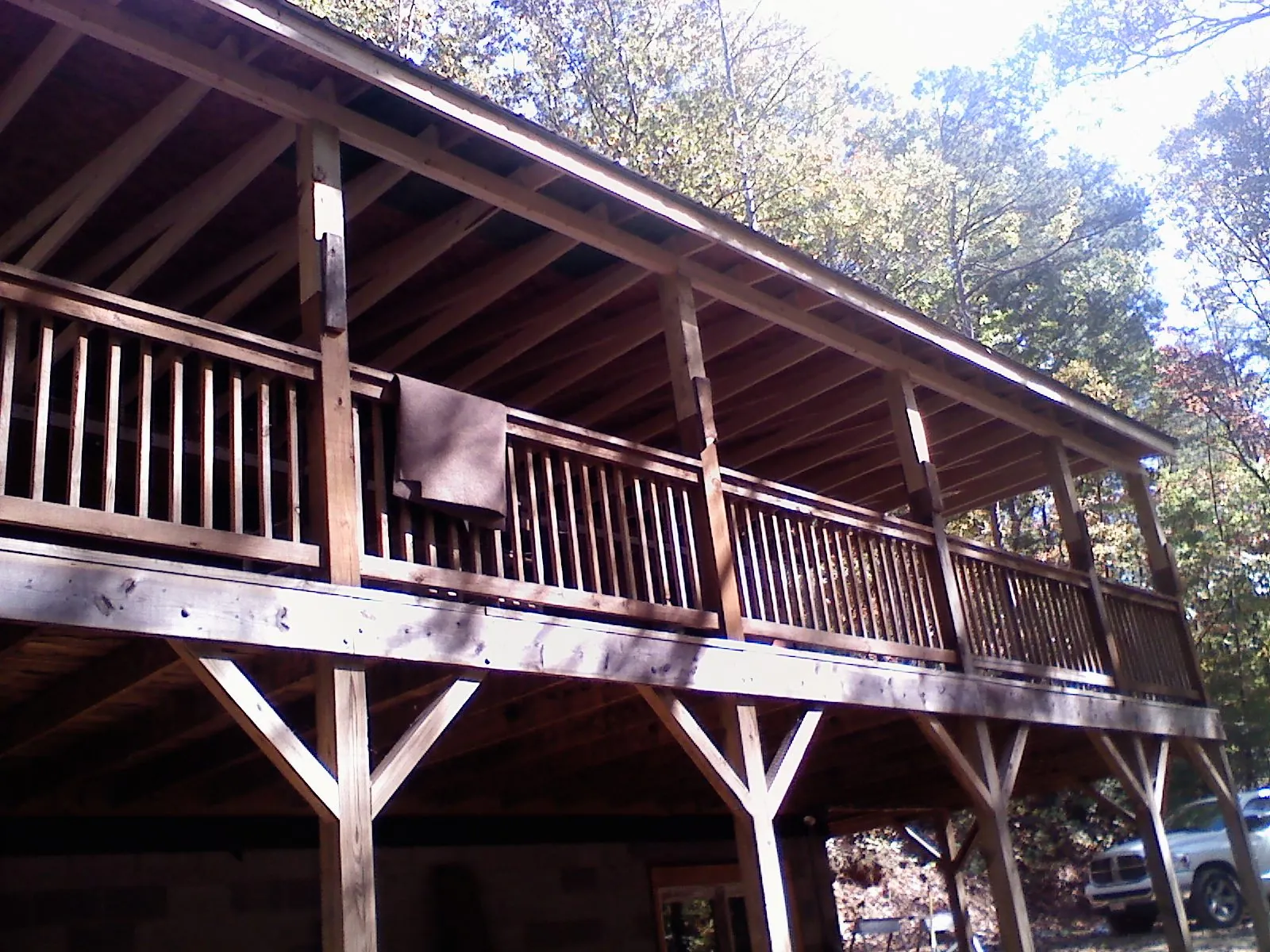 Timber framing under a new elevated porch and deck — Roof Leak Repair in Ray by Roofing Brothers
